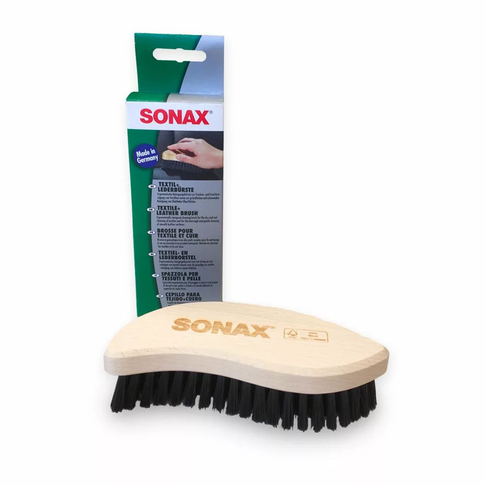 Čisticí kartáč na textil a kůži